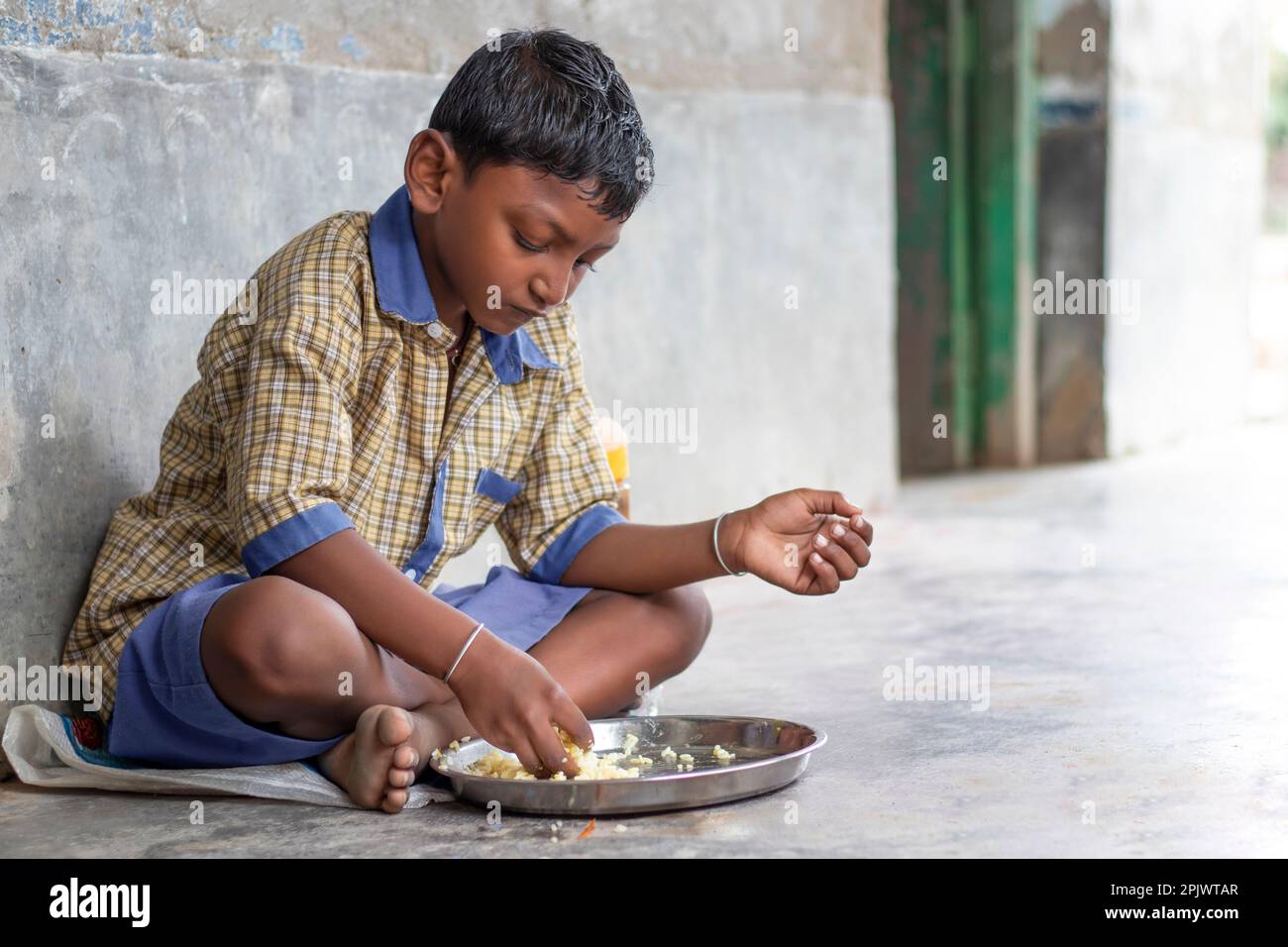 Student having mid day meal at school Stock Photo