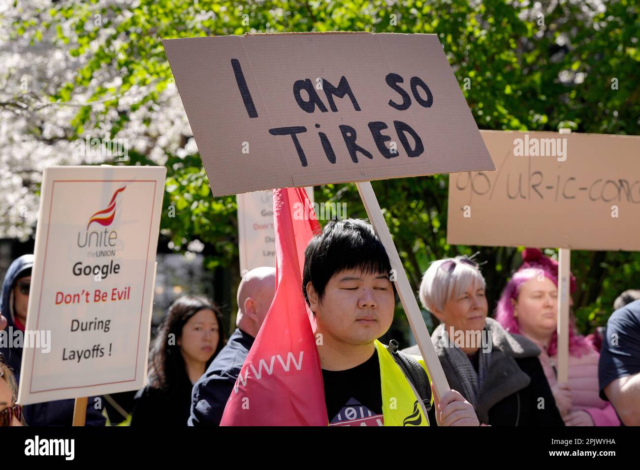 Google employees hold signs during a protest outside Google ...