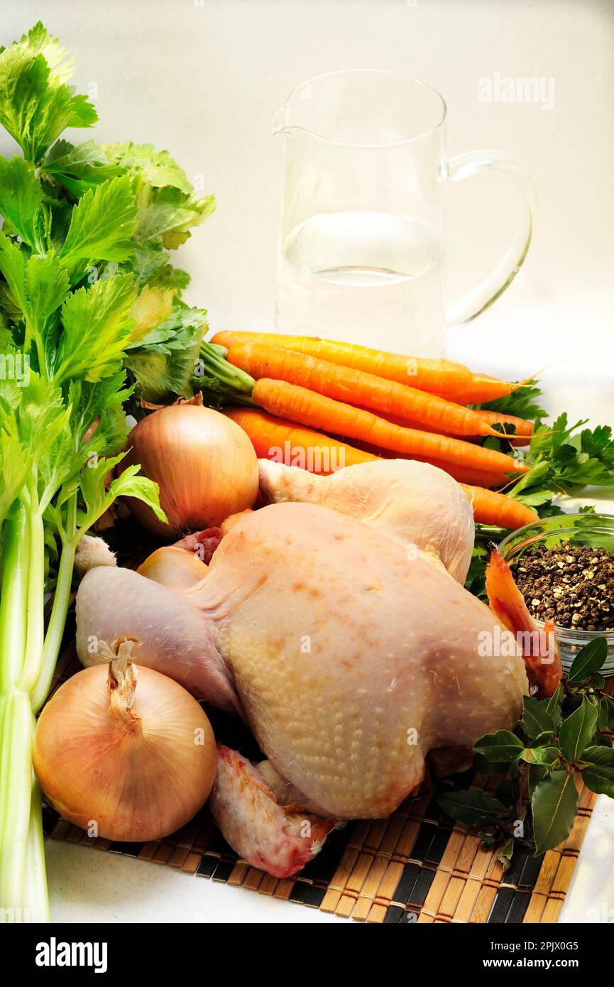 Preparation of chicken broth, Italy, Europe Stock Photo Alamy