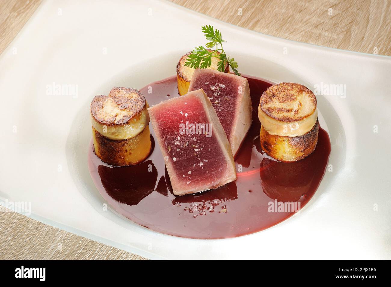 Panseared red tuna fillet, foie gras escalope, Cannonau sauce and