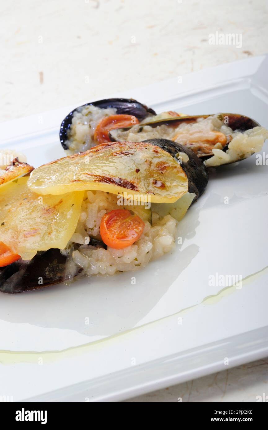 Rice, potatoes and mussels is a typical dish from the tradition of