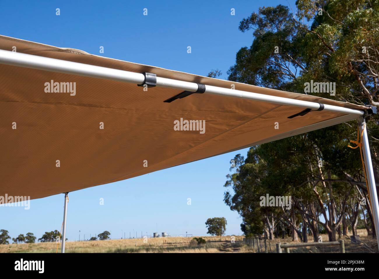 The side awning attached to a 4x4 for shelter when camping from sun and