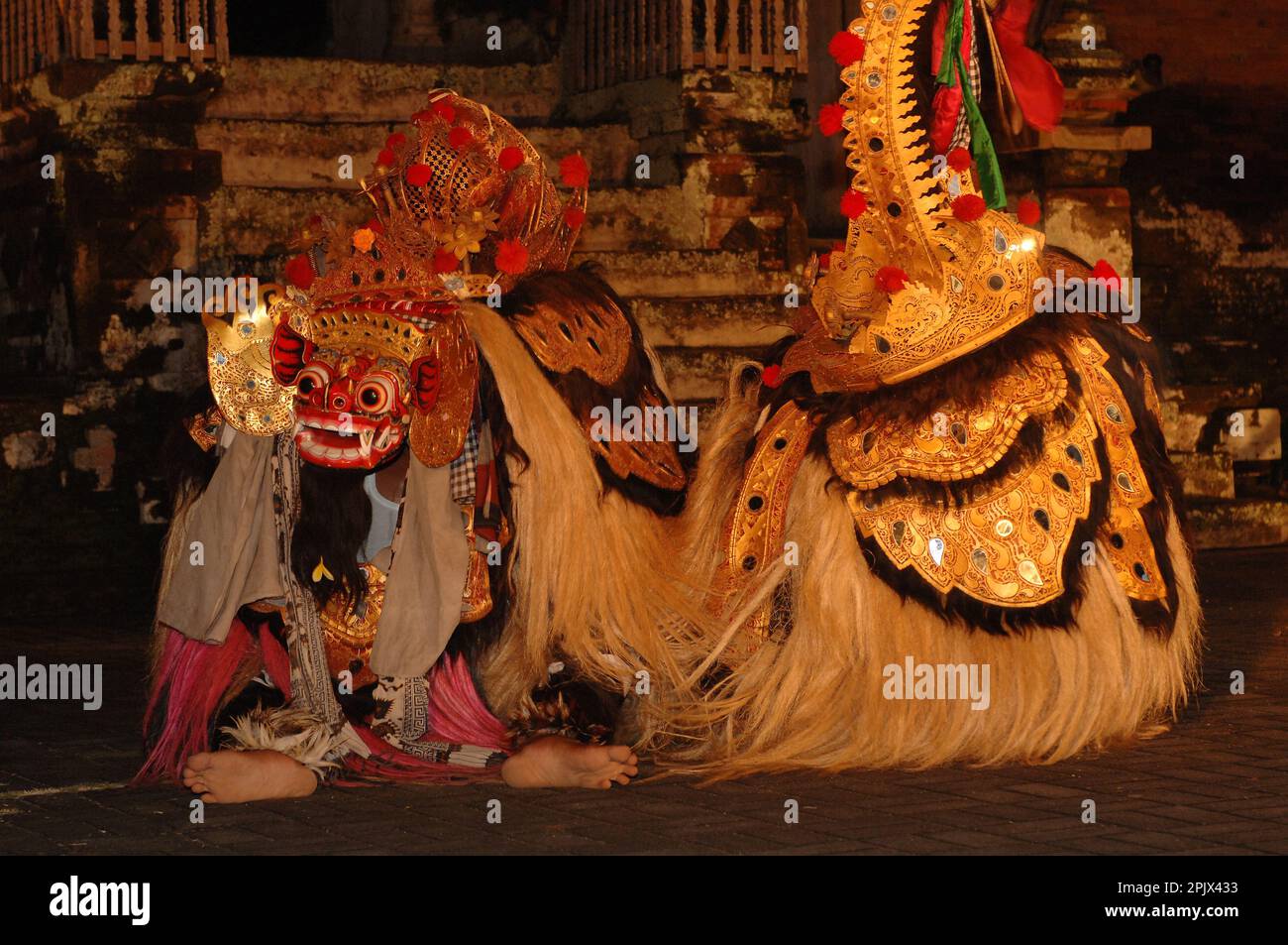 Typical dance with Barong masks at Pura Taman Ayun temple in Mengwi, Bali. Stock Photo