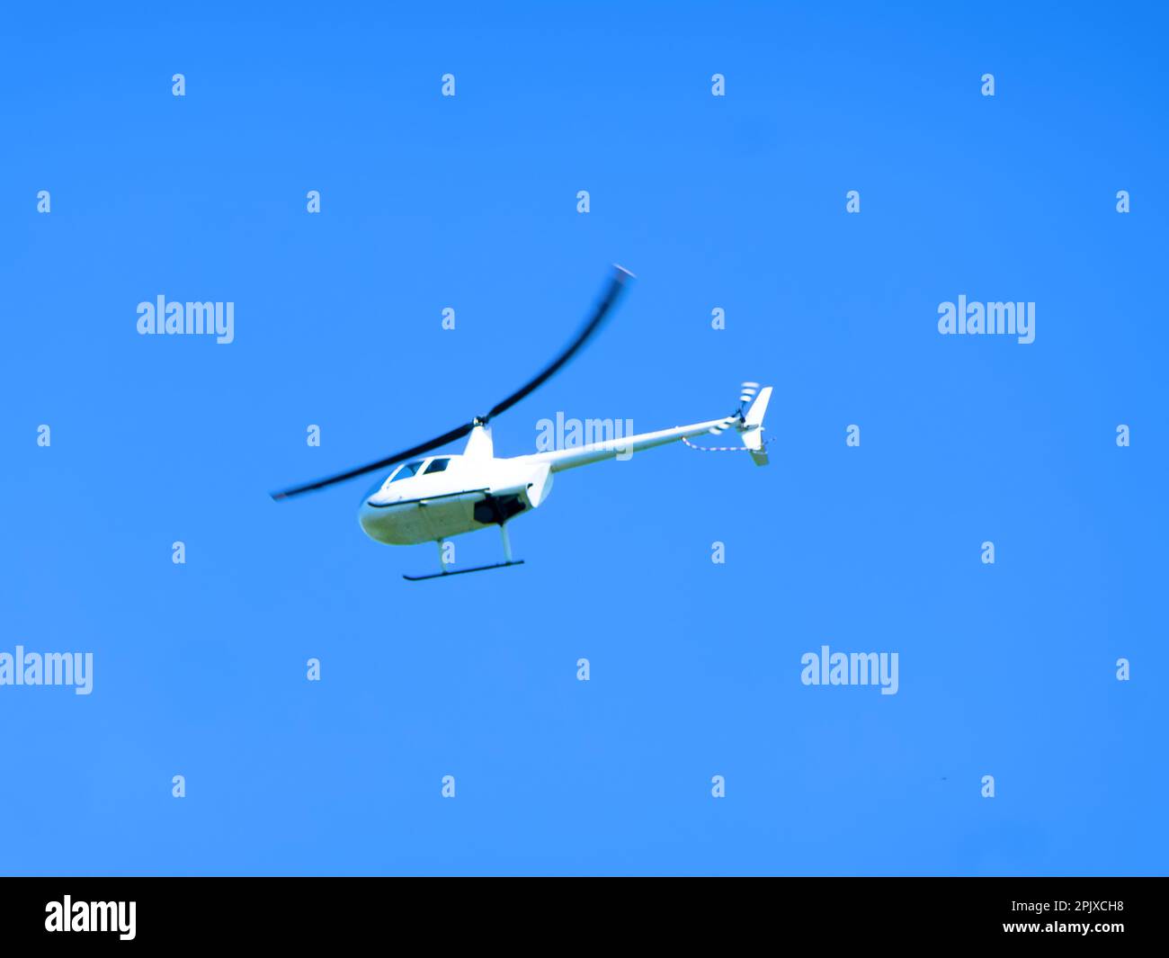 A light helicopter. Aerial evolutions Stock Photo Alamy