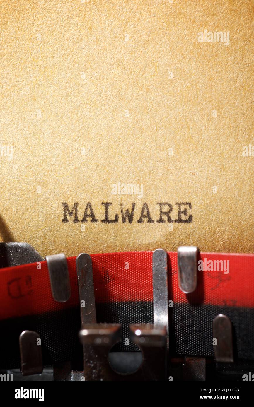 Malware word written with a typewriter. Stock Photo