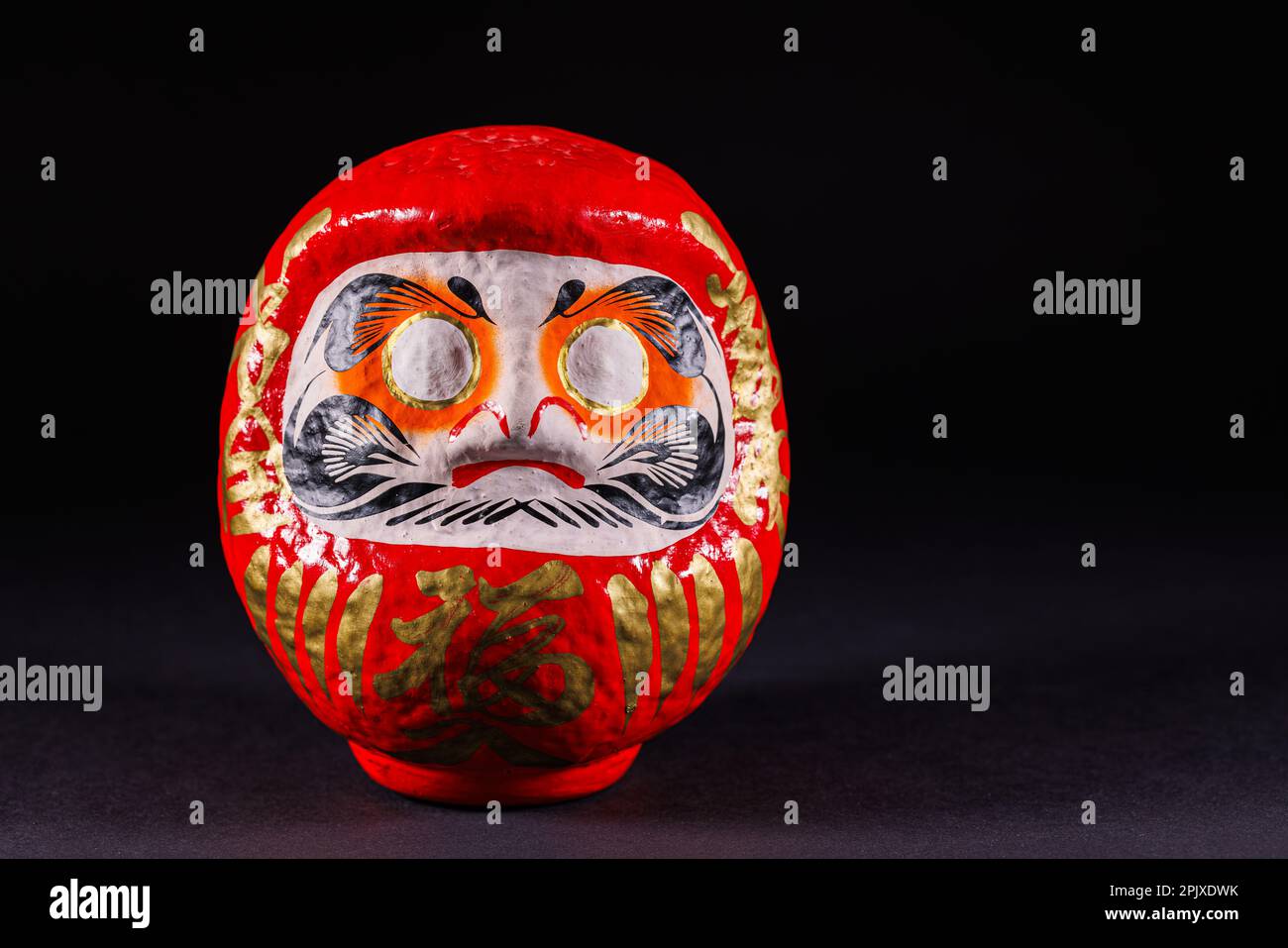 An old daruma doll Stock Photo Alamy