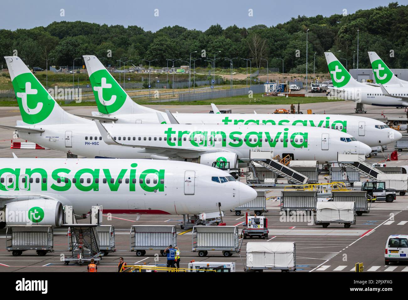 Transavia low-cost airline passenger planes on the tarmac of Eindhoven Airport. The Netherlands - June 29, 2020 Stock Photo