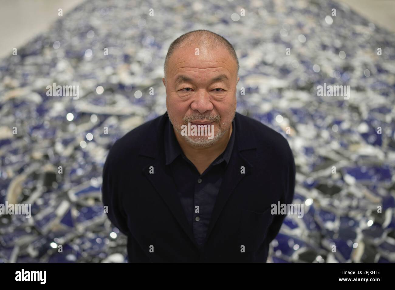 Dissident Chinese Artist And Activist Ai Weiwei Poses For A Photograph At His Exhibition Making