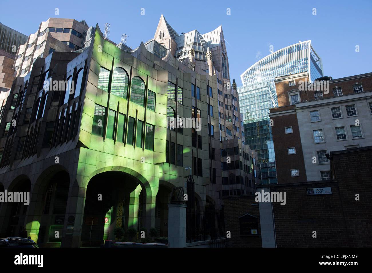 A building is seen illuminated by a reflection of sunlight from another ...