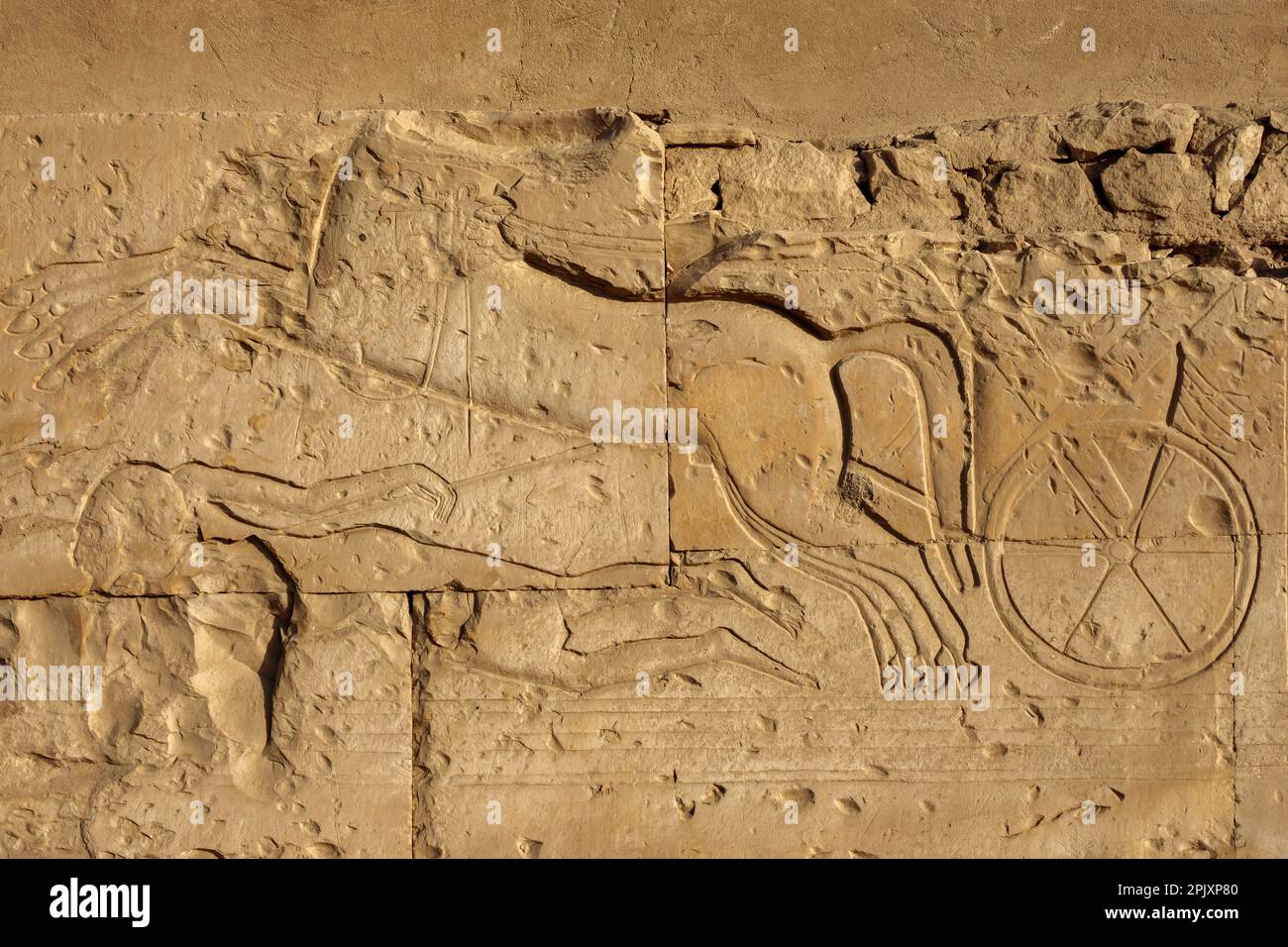 Detail of battle scenes in forecourt of Temple of Seti I, Abydos, Egypt Stock Photo