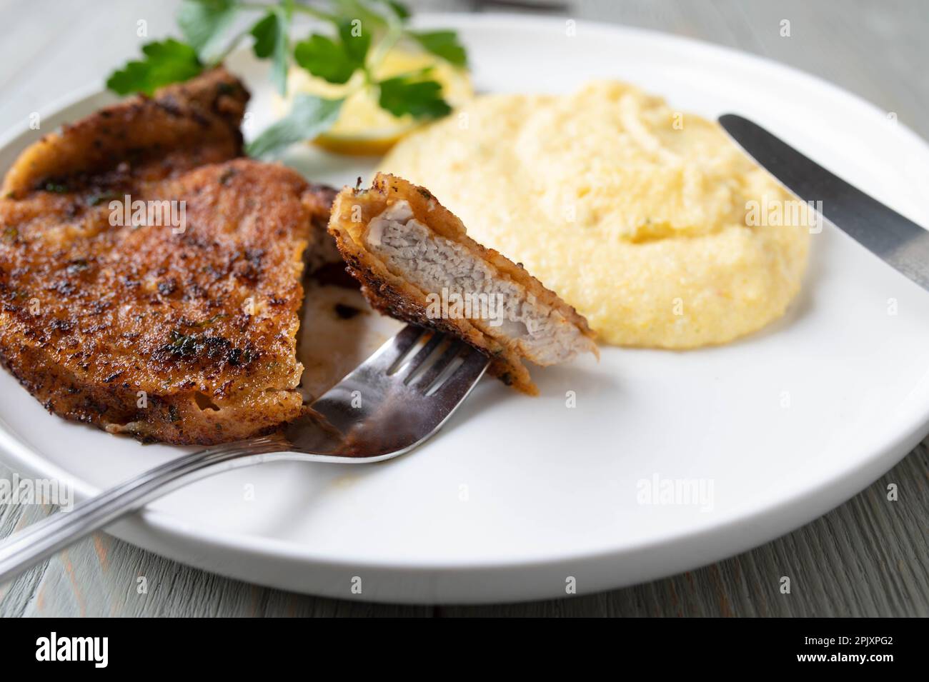 Italian breaded pork chop with parmesan cheese. Served with fresh