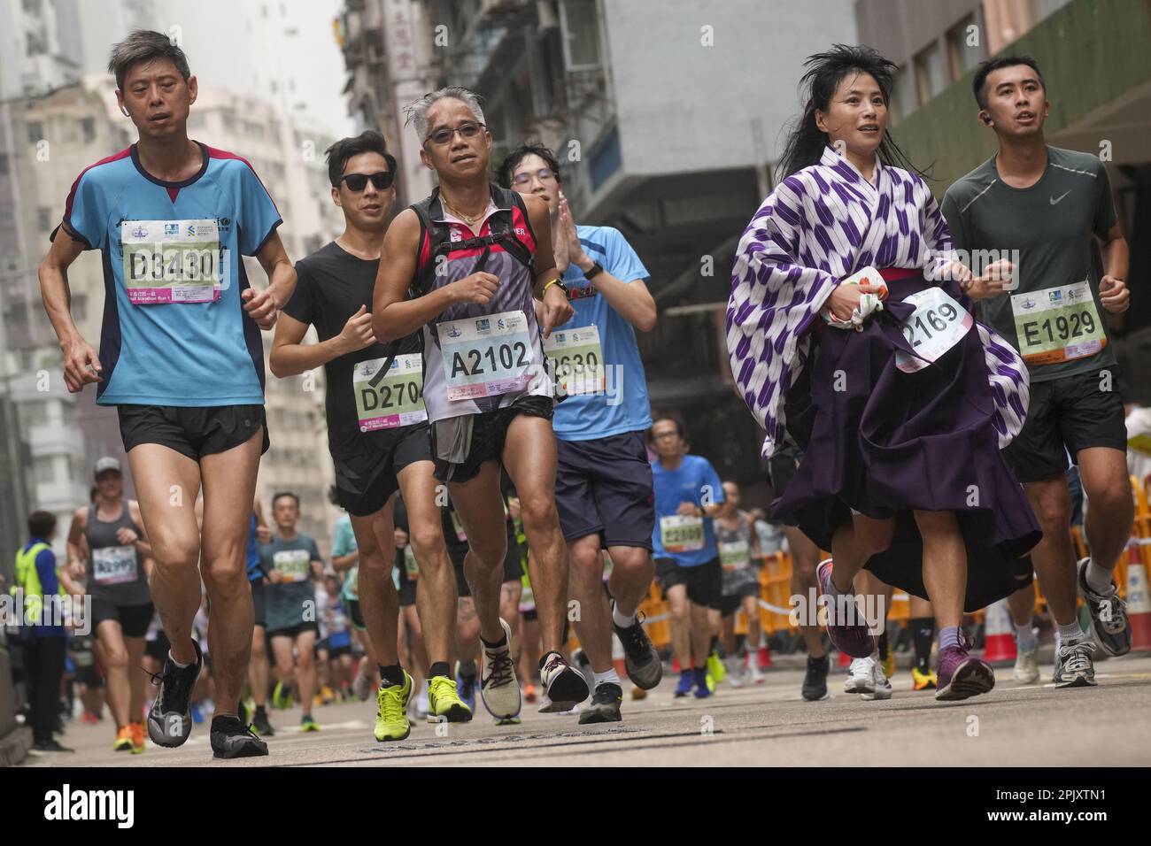 Standard Chartered Hong Kong Marathon 2023 / Runners are running along