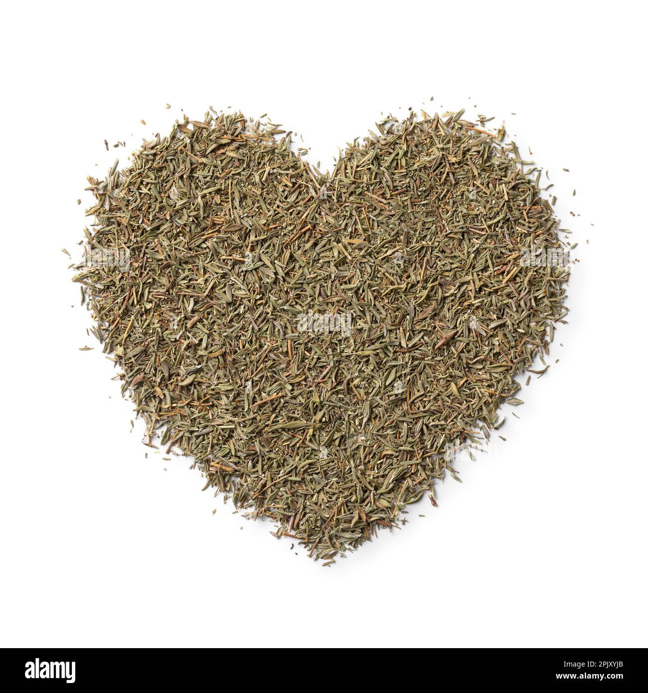 Dried Thyme in heart shape close up isolated on white background for seasoning Stock Photo