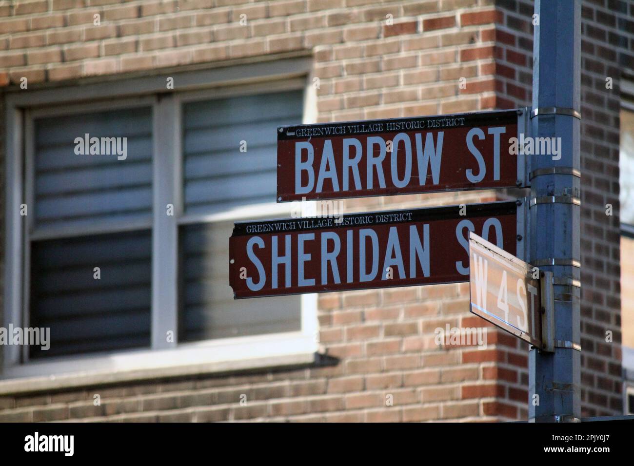 Brown Barrow Street and Sheridan Square historic sign in Midtown Manhattan in New York City