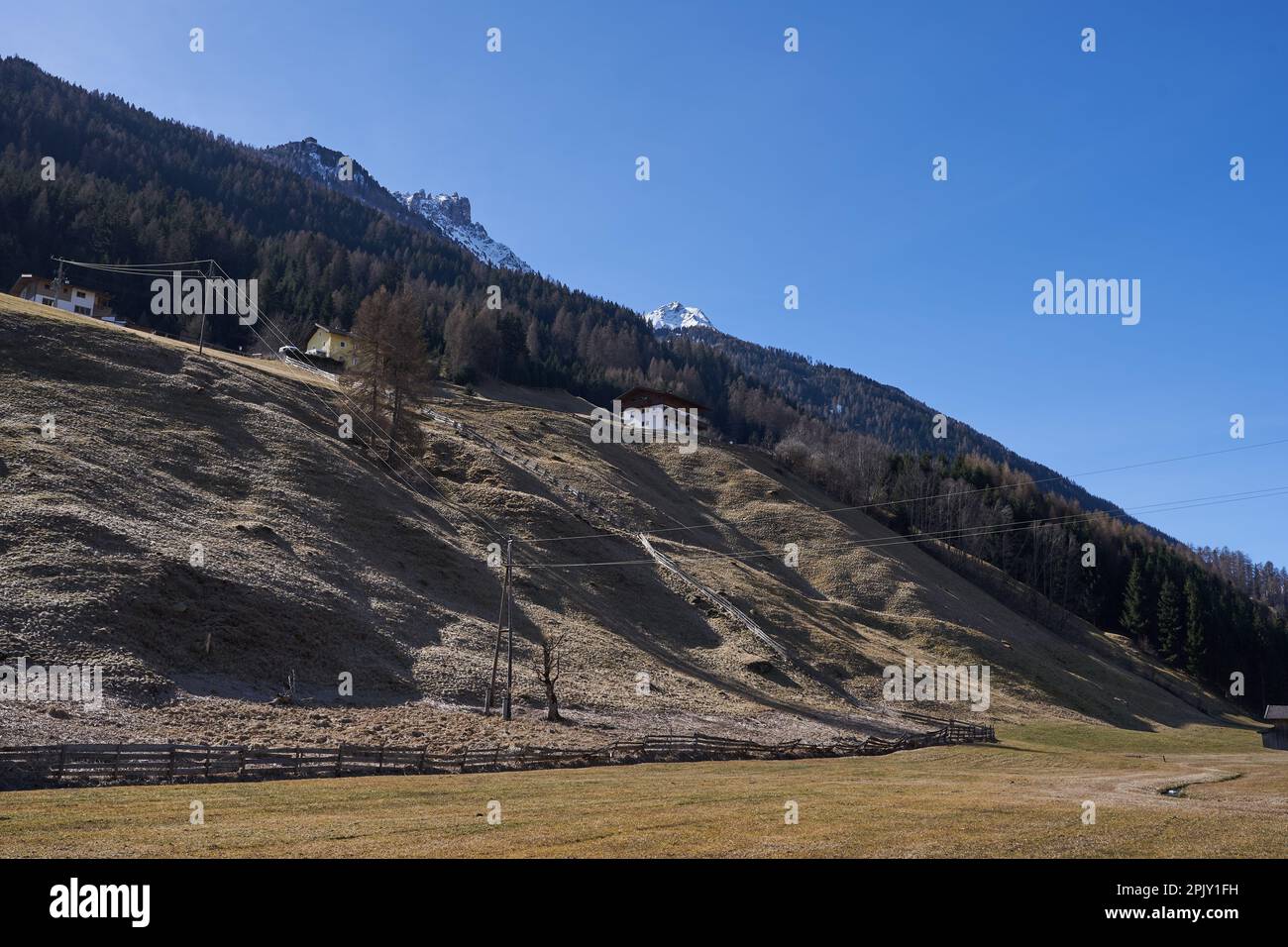Neustift im Stubaital, Austria - March 16, 2023 - beautiful meadows and hillsides near Neustift at the end of the winter season Stock Photo