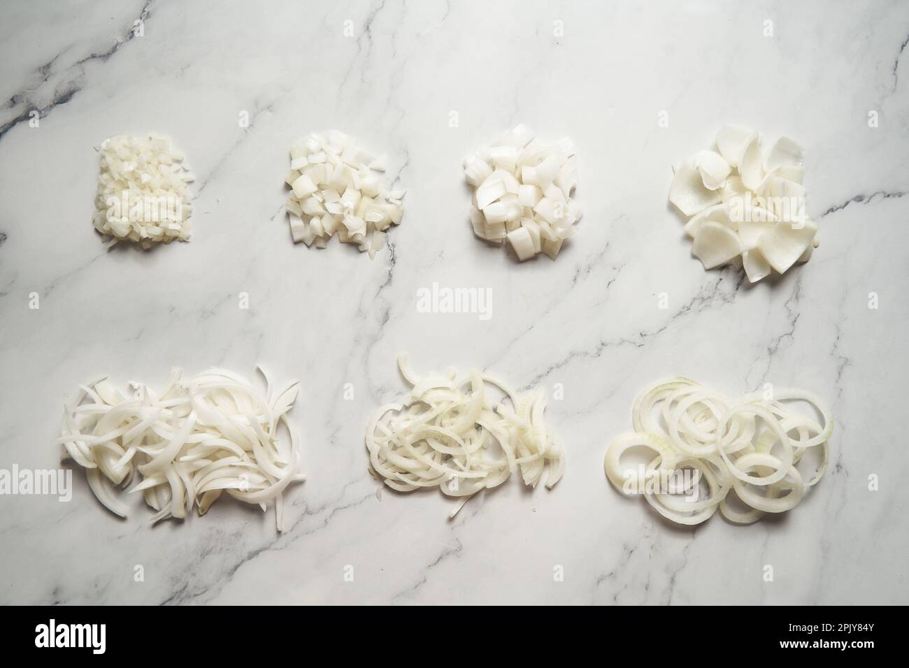 Different cuts of onions. Photo show different onion cuts from small to