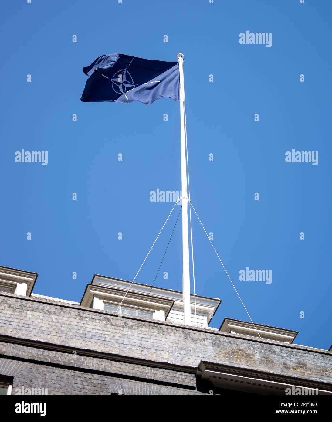 London, UK. 4th Apr, 2023. The NATO flag flies over 10 Downing Street to celebrate the accession of Finland to NATO. Credit: Ian Davidson/Alamy Live News Stock Photo