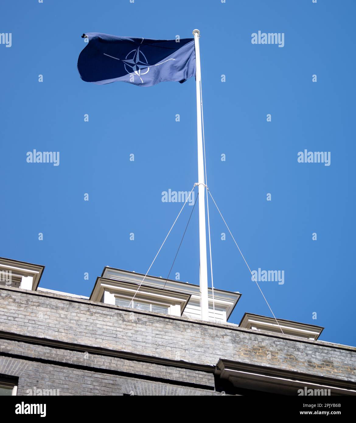 London, UK. 4th Apr, 2023. The NATO flag flies over 10 Downing Street to celebrate the accession of Finland to NATO. Credit: Ian Davidson/Alamy Live News Stock Photo