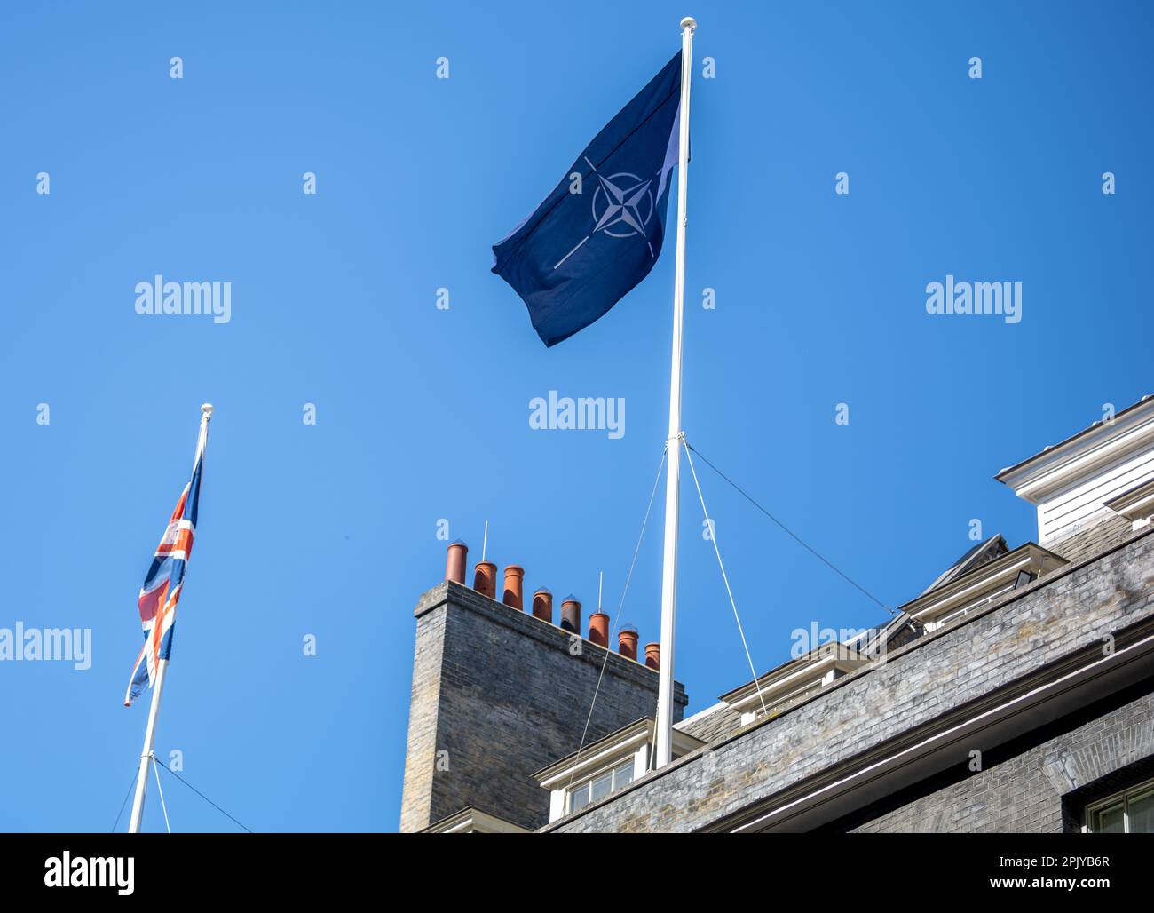 London, UK. 4th Apr, 2023. The NATO flag flies over 10 Downing Street to celebrate the accession of Finland to NATO. Credit: Ian Davidson/Alamy Live News Stock Photo