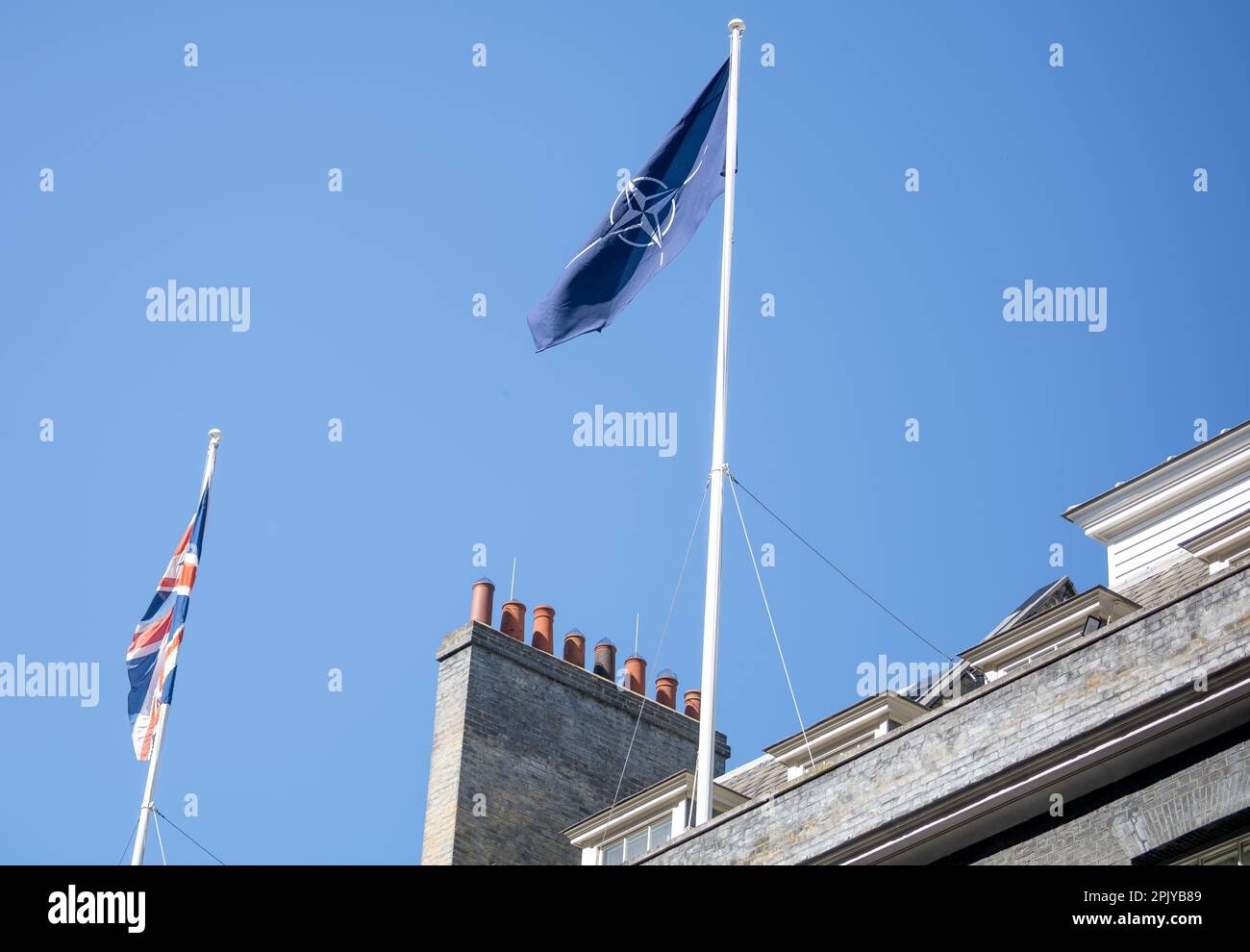 London, UK. 4th Apr, 2023. The NATO flag flies over 10 Downing Street to celebrate the accession of Finland to NATO. Credit: Ian Davidson/Alamy Live News Stock Photo