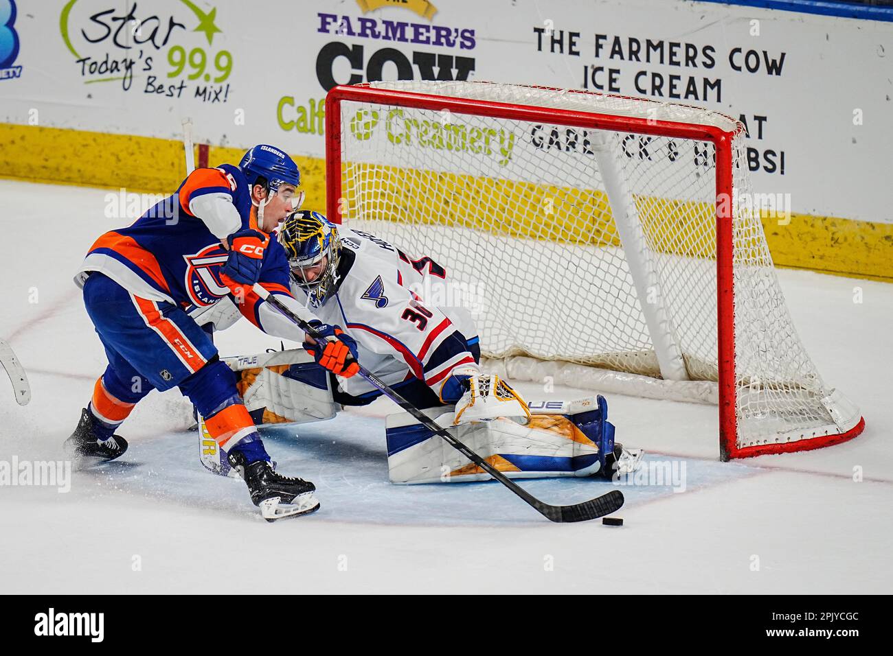 Bridgeport, Connecticut, USA. 4th Apr, 2023. Springfield Thunderbirds goalie Joel Hofer (30) guards the goal from Bridgeport Islanders Chris Terry (25) during an American Hockey League game at Total Mortgage Arena in Bridgeport, Connecticut. Rusty Jones/Cal Sport Media/Alamy Live News Stock Photo