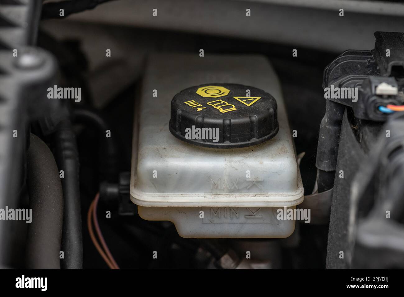 Brake fluid reservoir of a small car Stock Photo Alamy