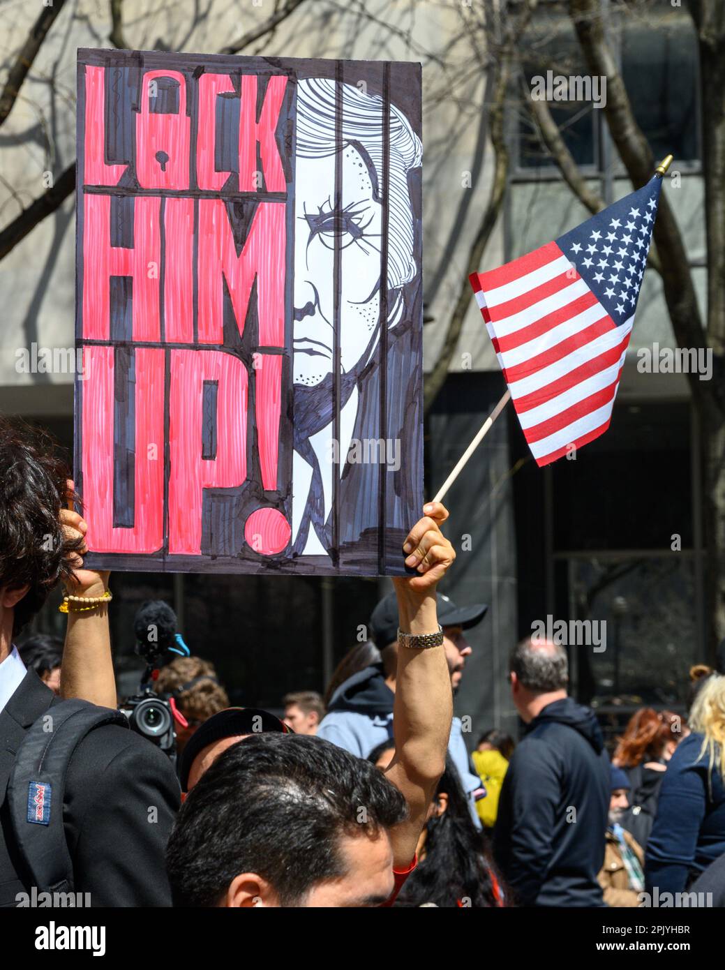New York, USA. 4th Apr, 2023. Demonstrators protest against former US President Donald Trump outside of the New York Criminal Court as they await Trump's arrival. Donald Trump became the first former US president to be indicted by a grand jury and surrendered to the authorities to face criminal charges. Credit: Enrique Shore/Alamy Live News Stock Photo