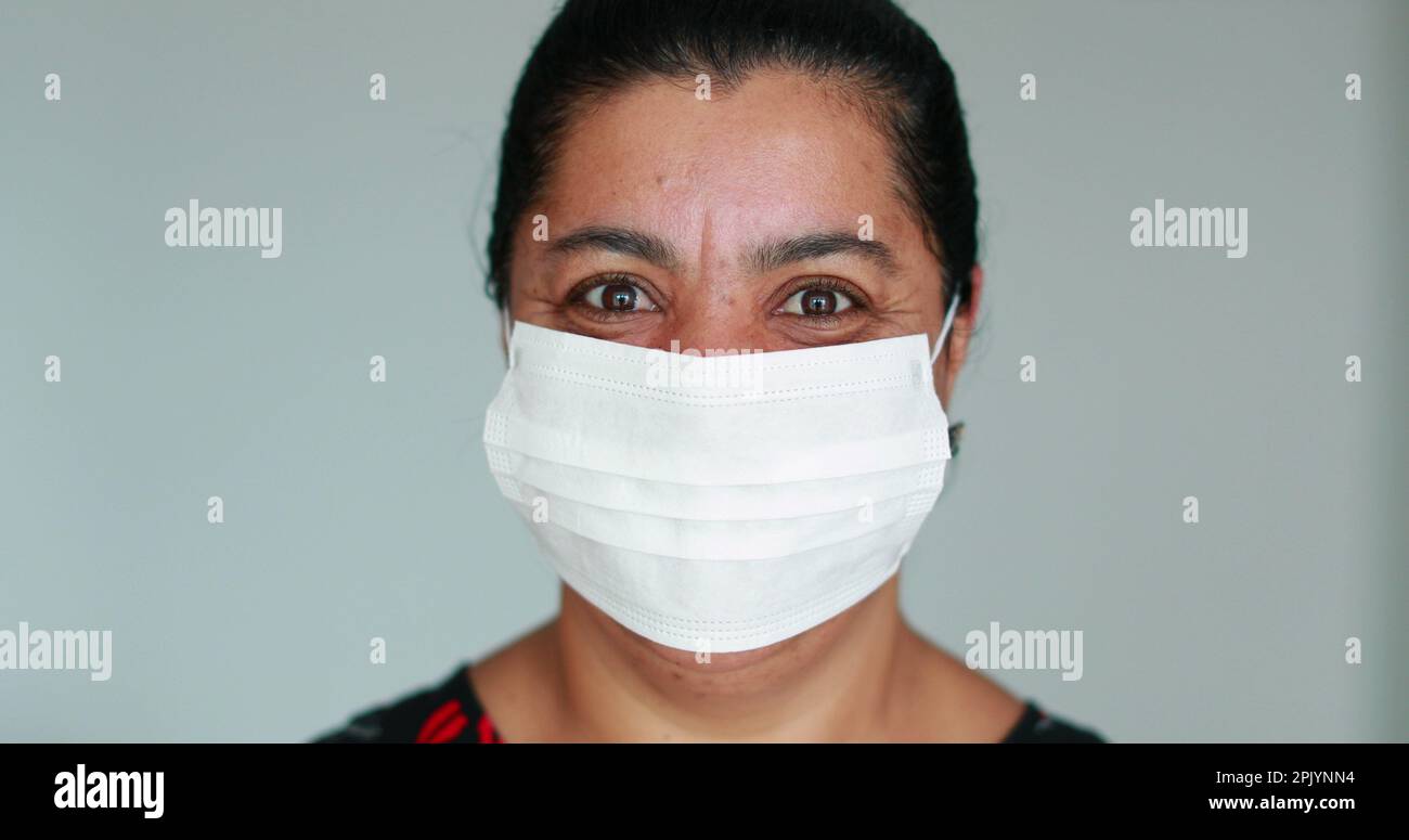 African woman removing covid 19 hi-res stock photography and images - Alamy