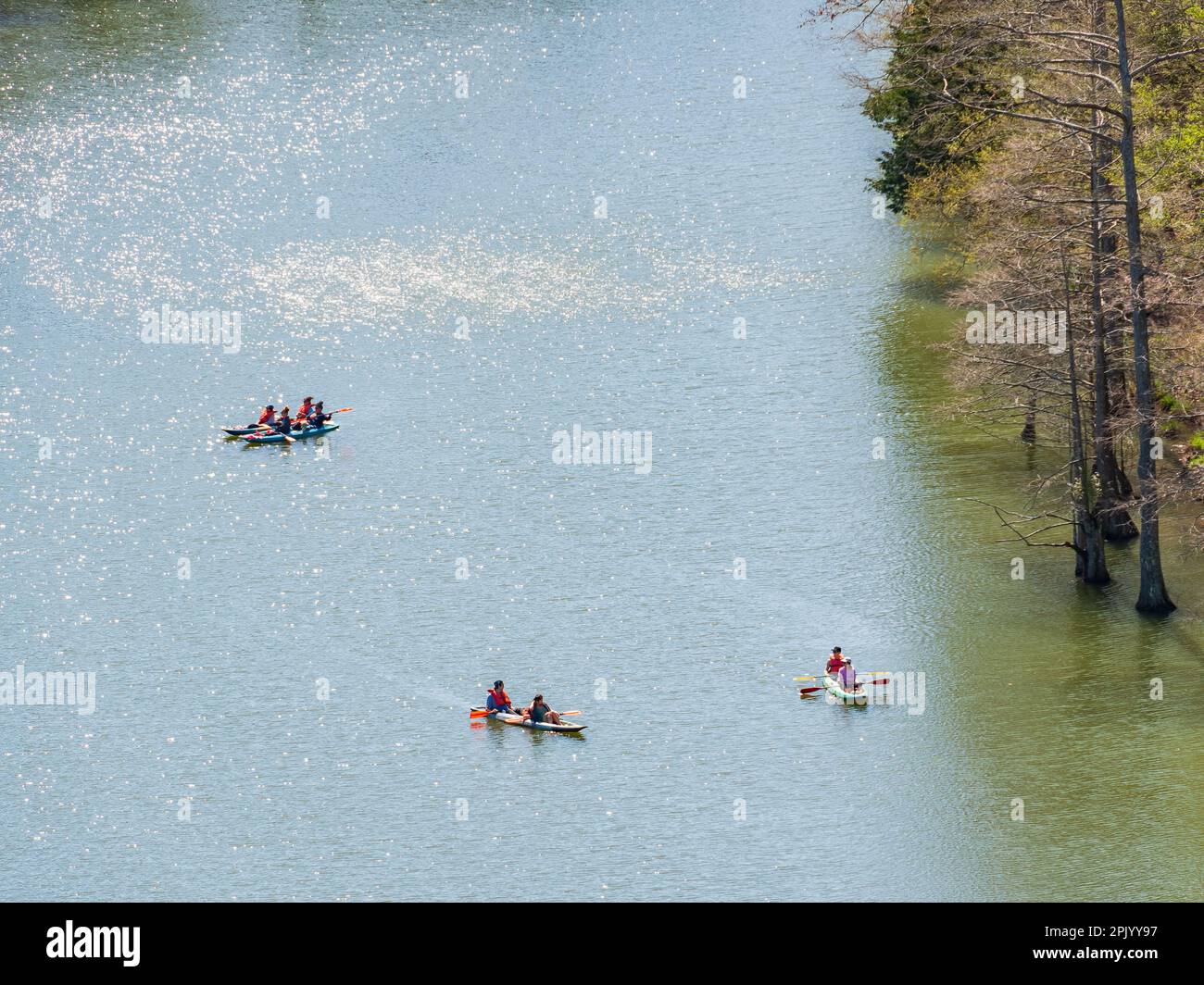 People playing Kayak, saw from Cedar Bluff Trail in Beavers Bend State Park at Oklahoma Stock