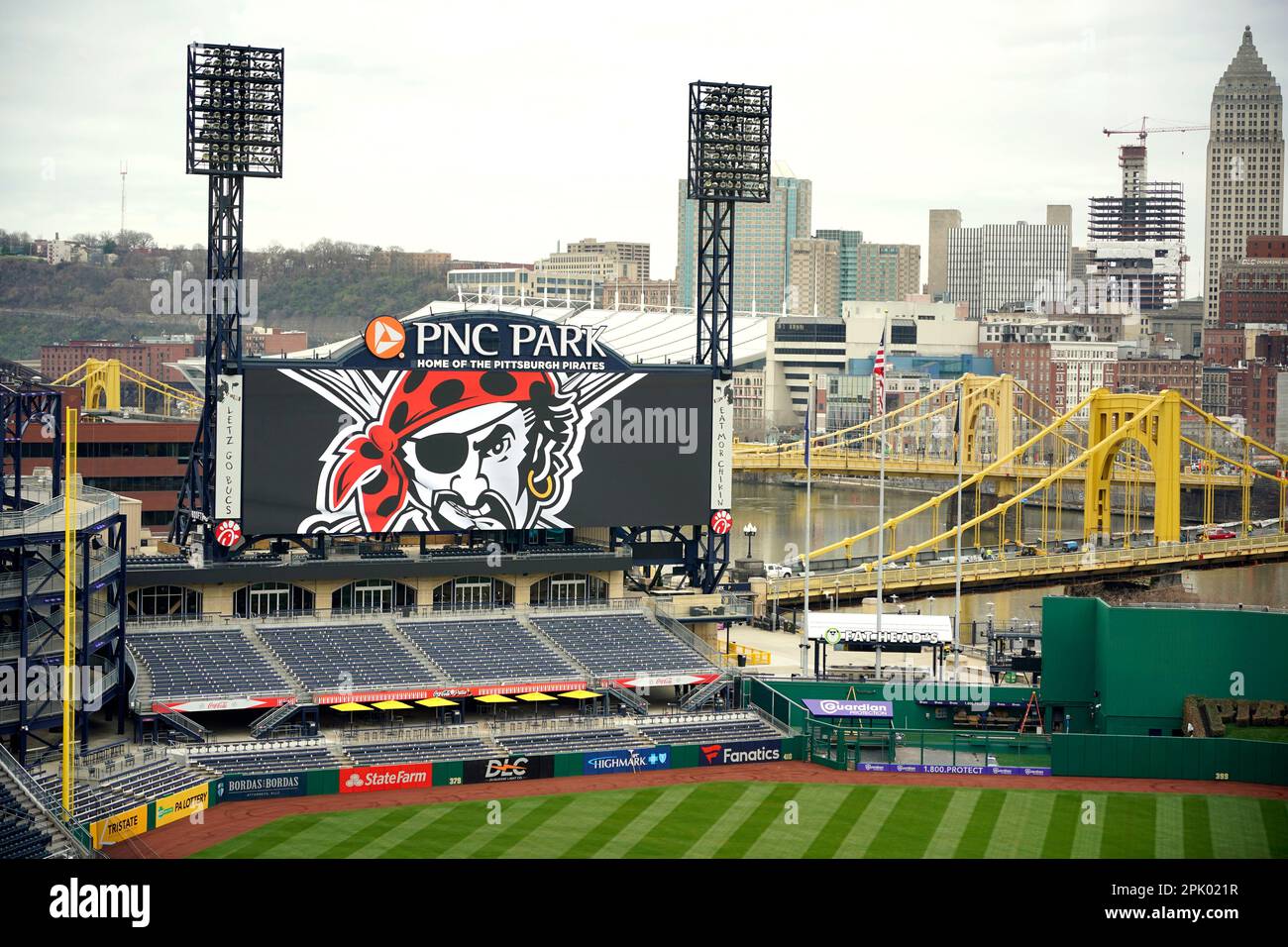 Grounds crew Jake Solmers and Bolton Hager paint the Opening Week logo on  the field at PNC Park, on Tuesday, April 4, 2023, in preparation for the  Pittsburgh Pirates home opener in