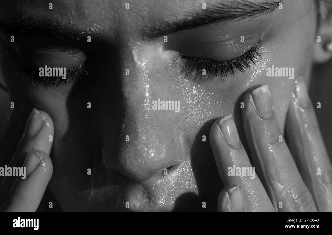 Woman washing face soap Black and White Stock Photos & Images Alamy