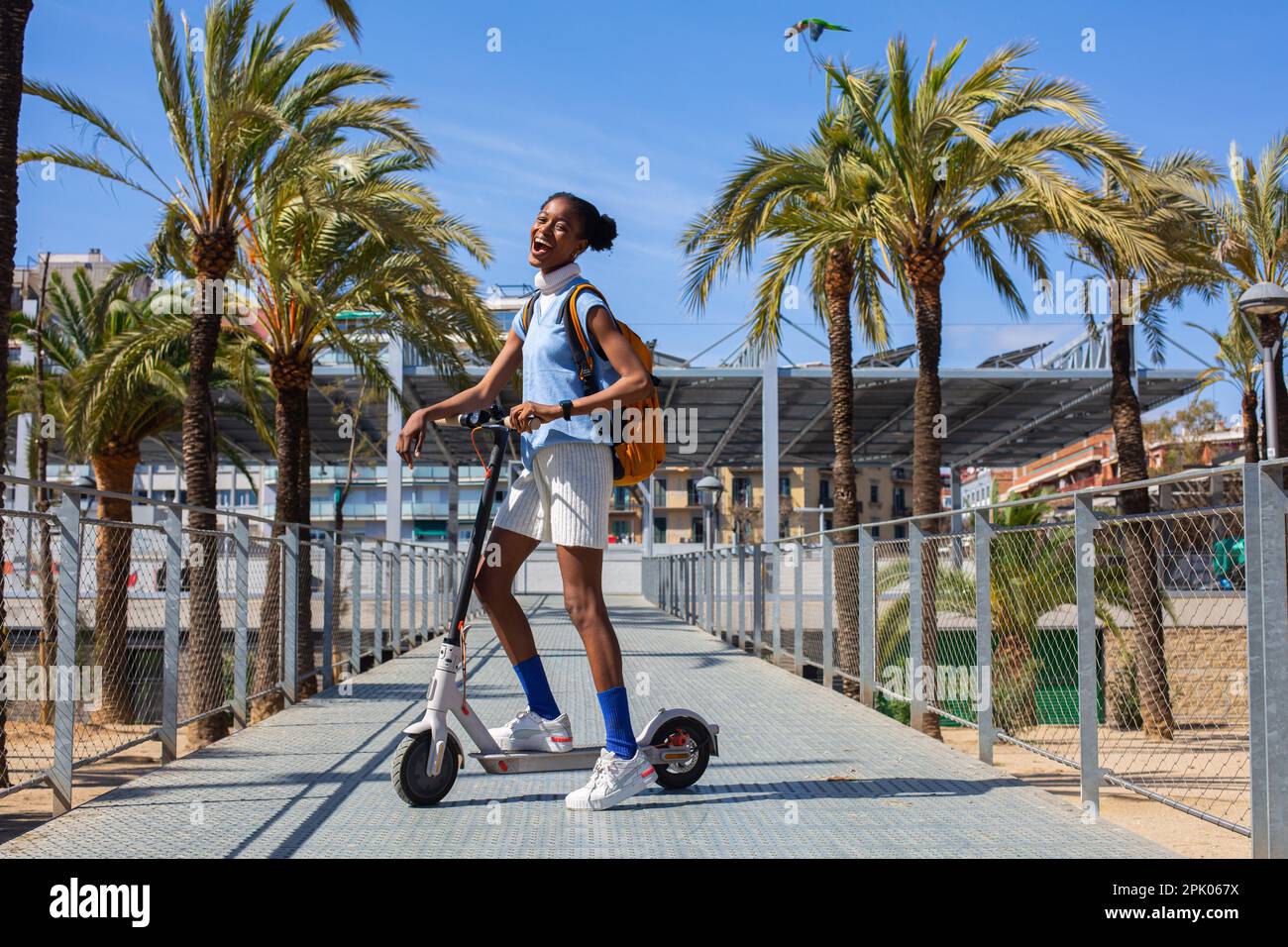 Girl on an electric scooter hi-res stock photography and images - Alamy