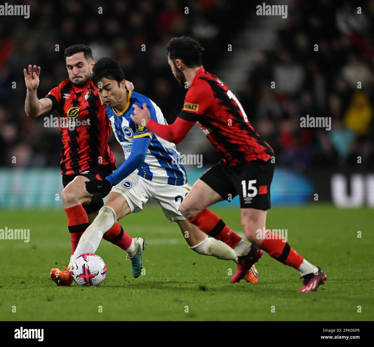 4th April 2023; Vitality Stadium, Boscombe, Dorset, England: Premier League Football, AFC Bournemouth versus Brighton and Hove Albion; Lewis Cook and Adam Smith of Bournemouth tackle Kaoru Mitoma of Brighton &amp; Hove Albion Stock Photo