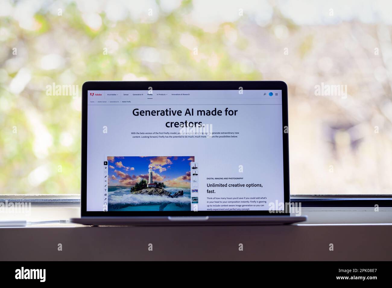 ITALY - April 4, 2023: Adobe Firefly website displayed on mac laptop screen. Adobe has announced the beta release of its AI Art Generator tool. Stock Photo