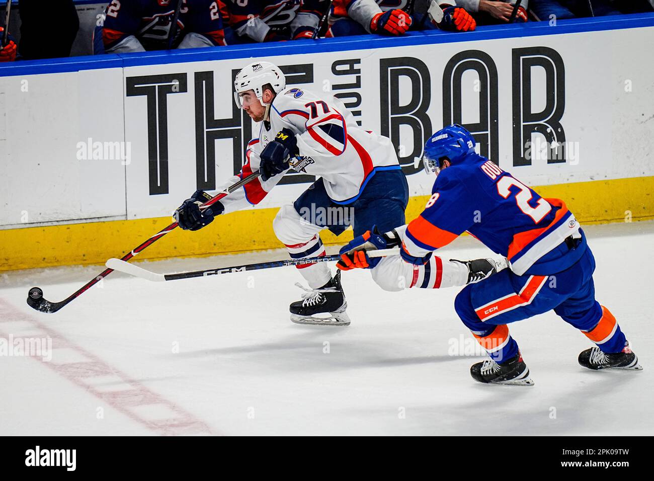 Bridgeport, Connecticut, USA. 4th Apr, 2023. Springfield Thunderbirds Drew Callin''¨ (77) moves the puck up ice against Bridgeport Islanders William Dufour (28) during an American Hockey League game at Total Mortgage Arena in Bridgeport, Connecticut. Rusty Jones/Cal Sport Media/Alamy Live News Stock Photo