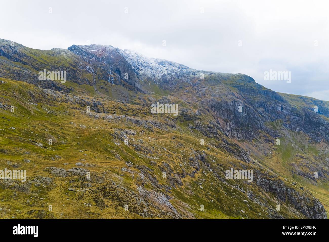 Beautiful mountain range of Wales Snowdonia. Cloudy weather. Popular UK travel destinations. High quality photo Stock Photo
