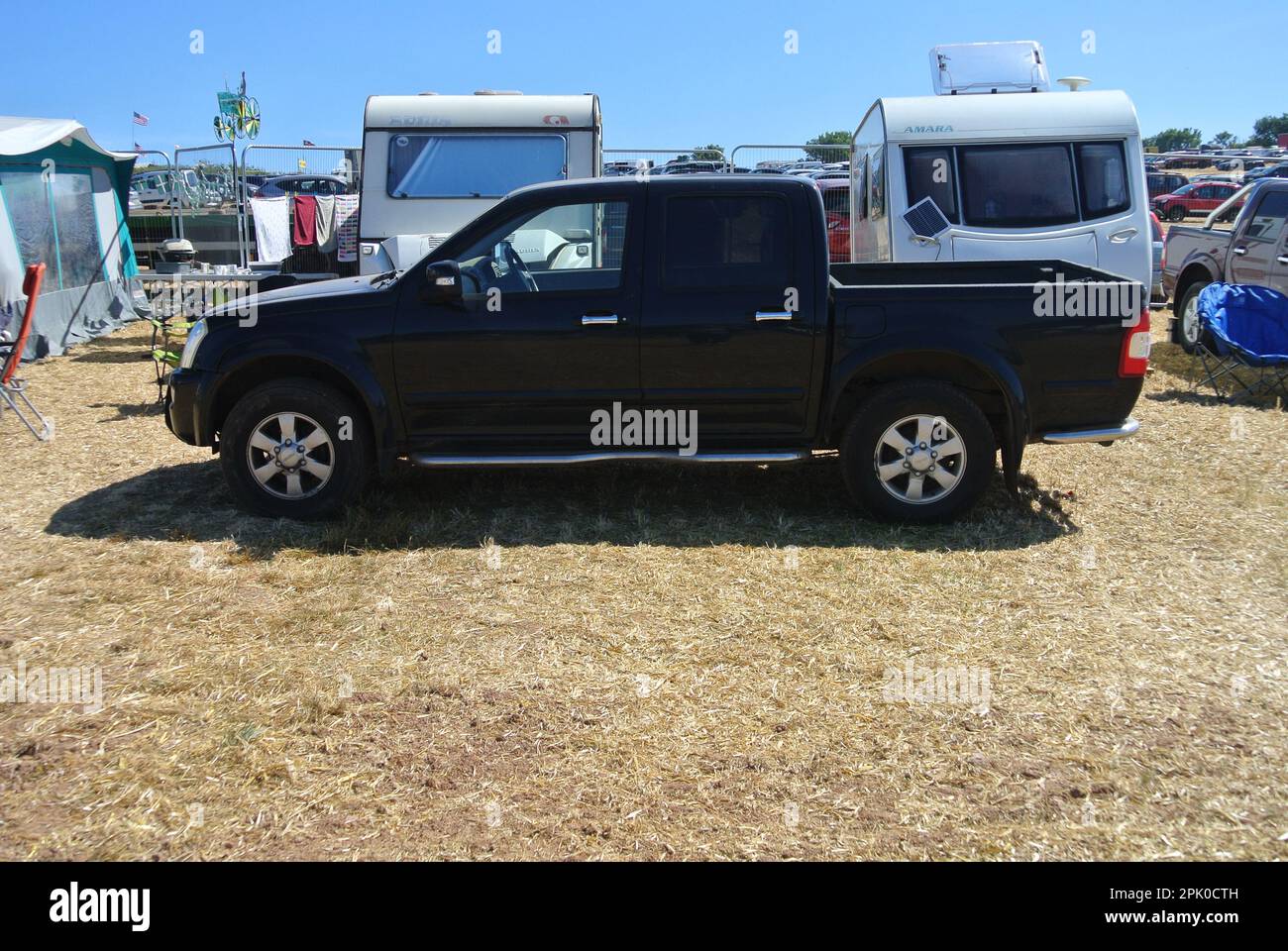 A 2006 Isuzu Rodeo Denver pickup truck parked on display at the Torbay Steam Fair, Devon