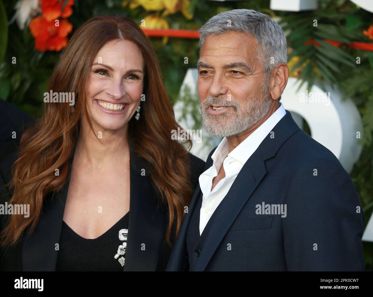 Julia Roberts and Clooney attend the "Ticket To Paradise" World