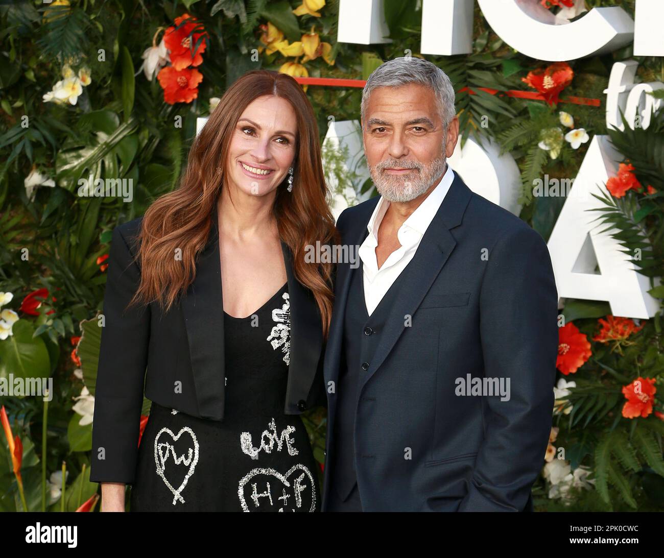 Julia Roberts and George Clooney attend the 'Ticket To Paradise' World Film Premiere at Odeon Luxe Leicester Square  in London. Stock Photo