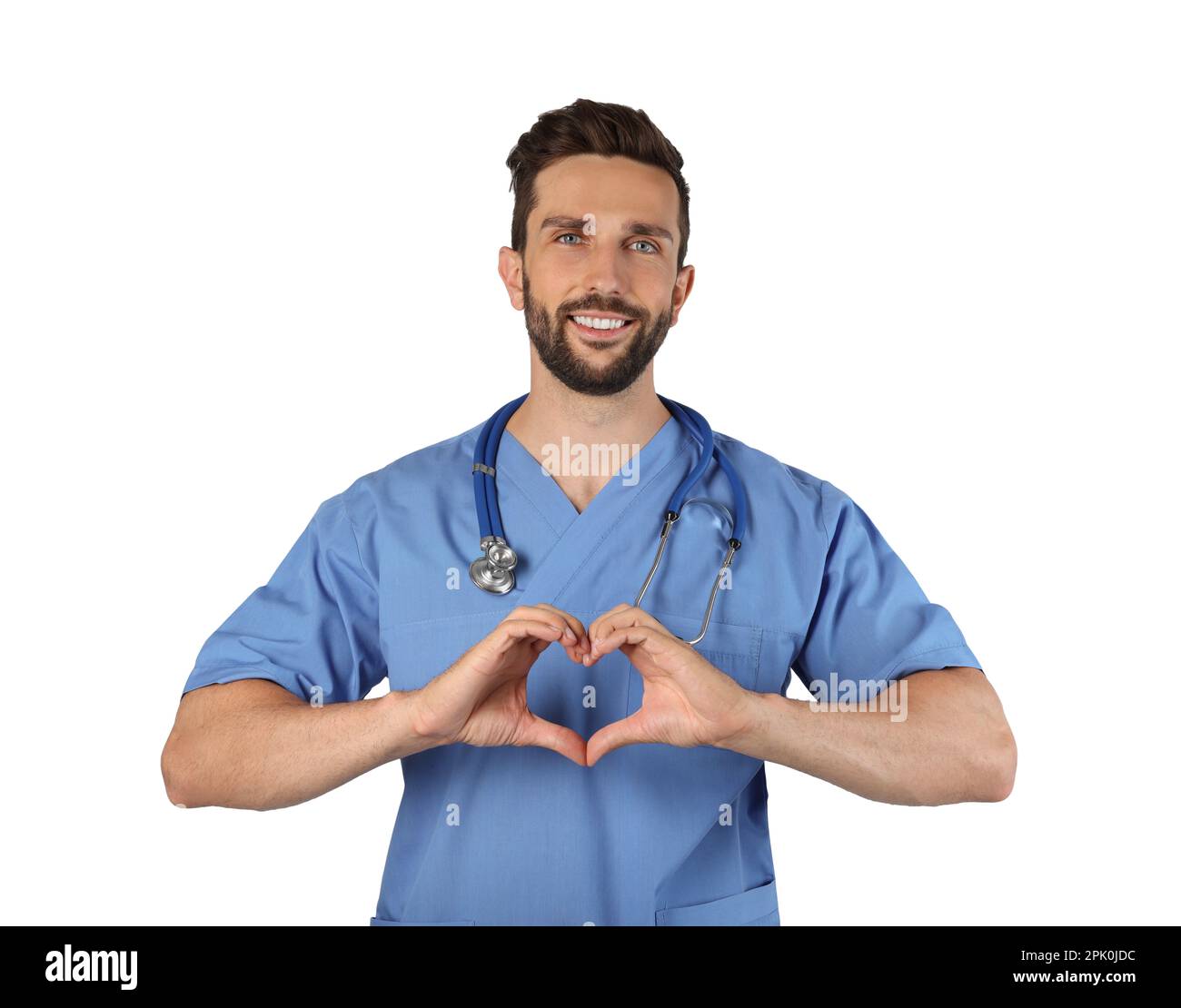 Doctor making heart with hands on white background Stock Photo - Alamy