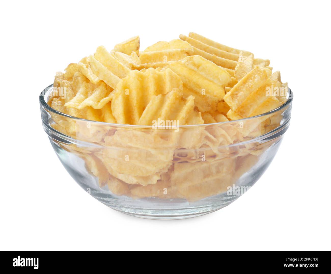 Bowl of tasty ridged potato chips on white background Stock Photo Alamy