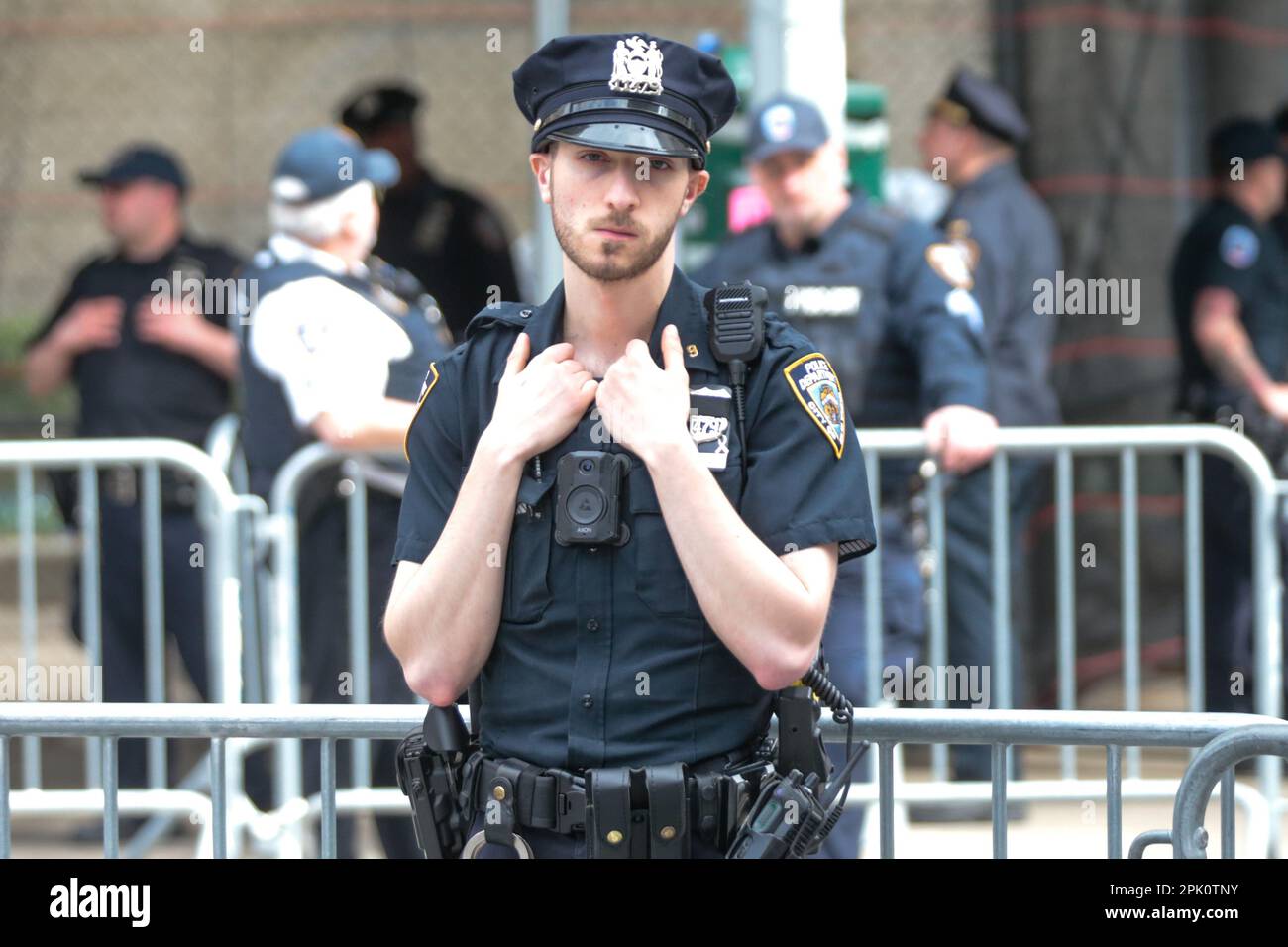 New York, New York, USA. 4th Apr, 2023. A police officer outside of the Manhattan District Court in New York, ahead of the arrival of former American president Trump on the day of Trump's arraignment hearing. Trump's arraignment drew crowds and chaos. (Credit Image: © William Volcov/ZUMA Press Wire) EDITORIAL USAGE ONLY! Not for Commercial USAGE! Stock Photo