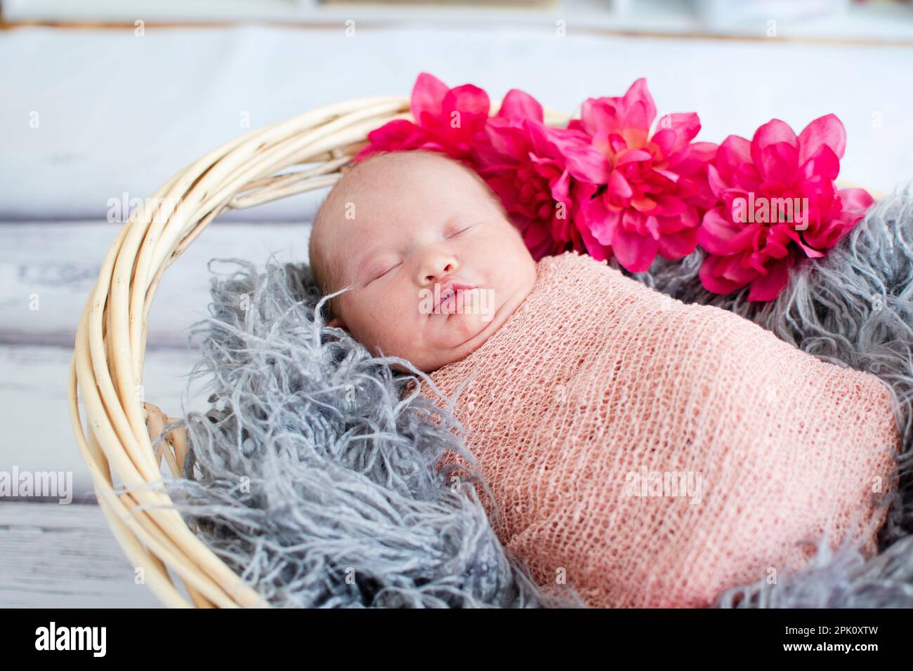 Sleeping white caucasian newborn baby close up. Angel's kiss, stork bite birth mark Stock Photo