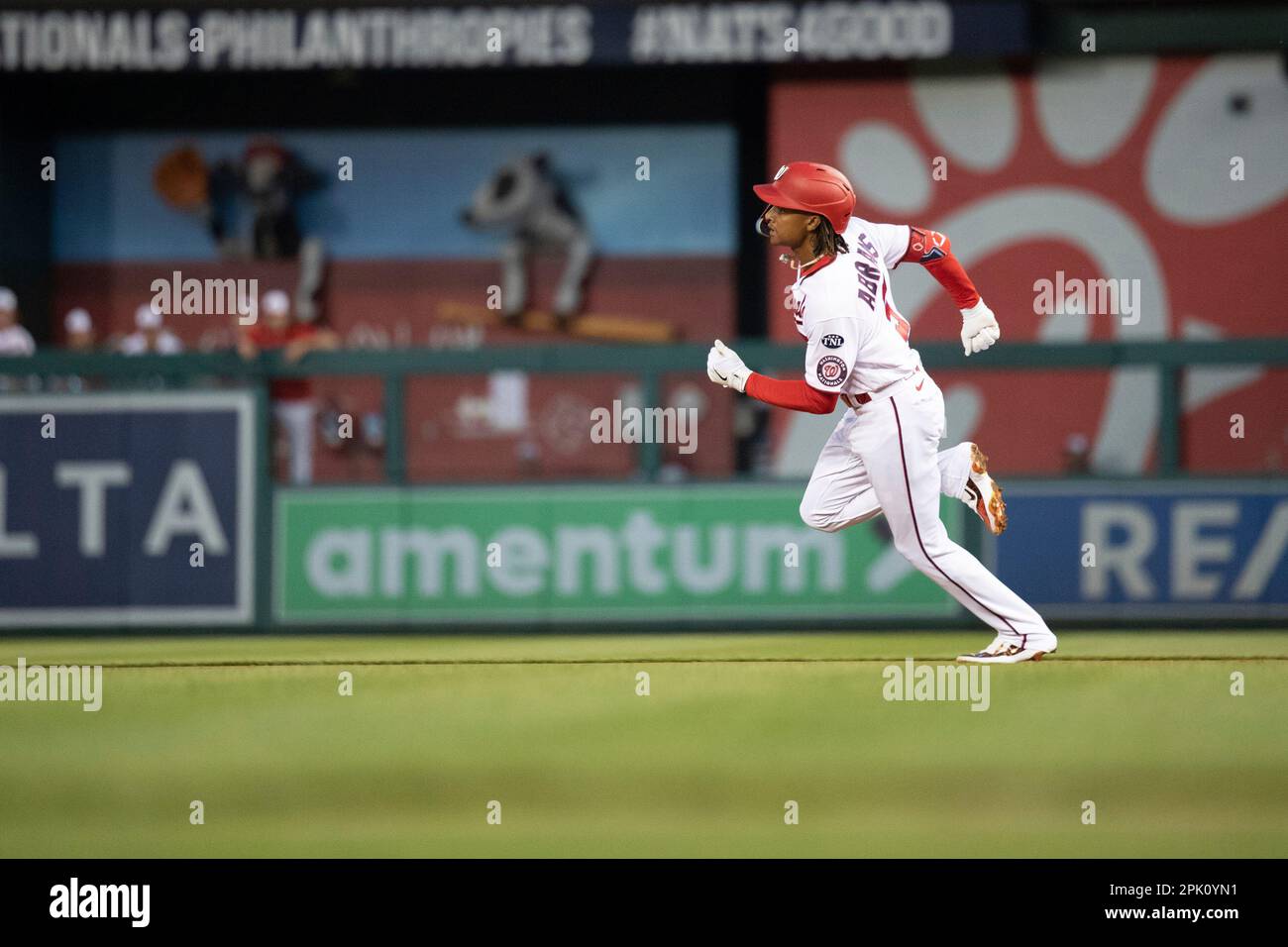 WASHINGTON, DC - APRIL 04: Washington Nationals shortstop CJ Abrams (5)  make contact with the ball during the Tampa Bay Rays versus Washington  Nationals MLB game at Nationals Park on April 4