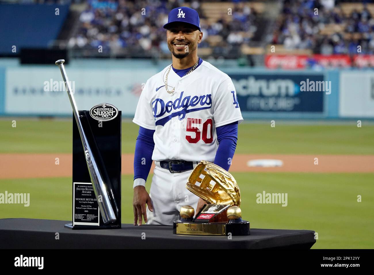 Los Angeles Dodgers' Mookie Betts (50) poses for a photo with the