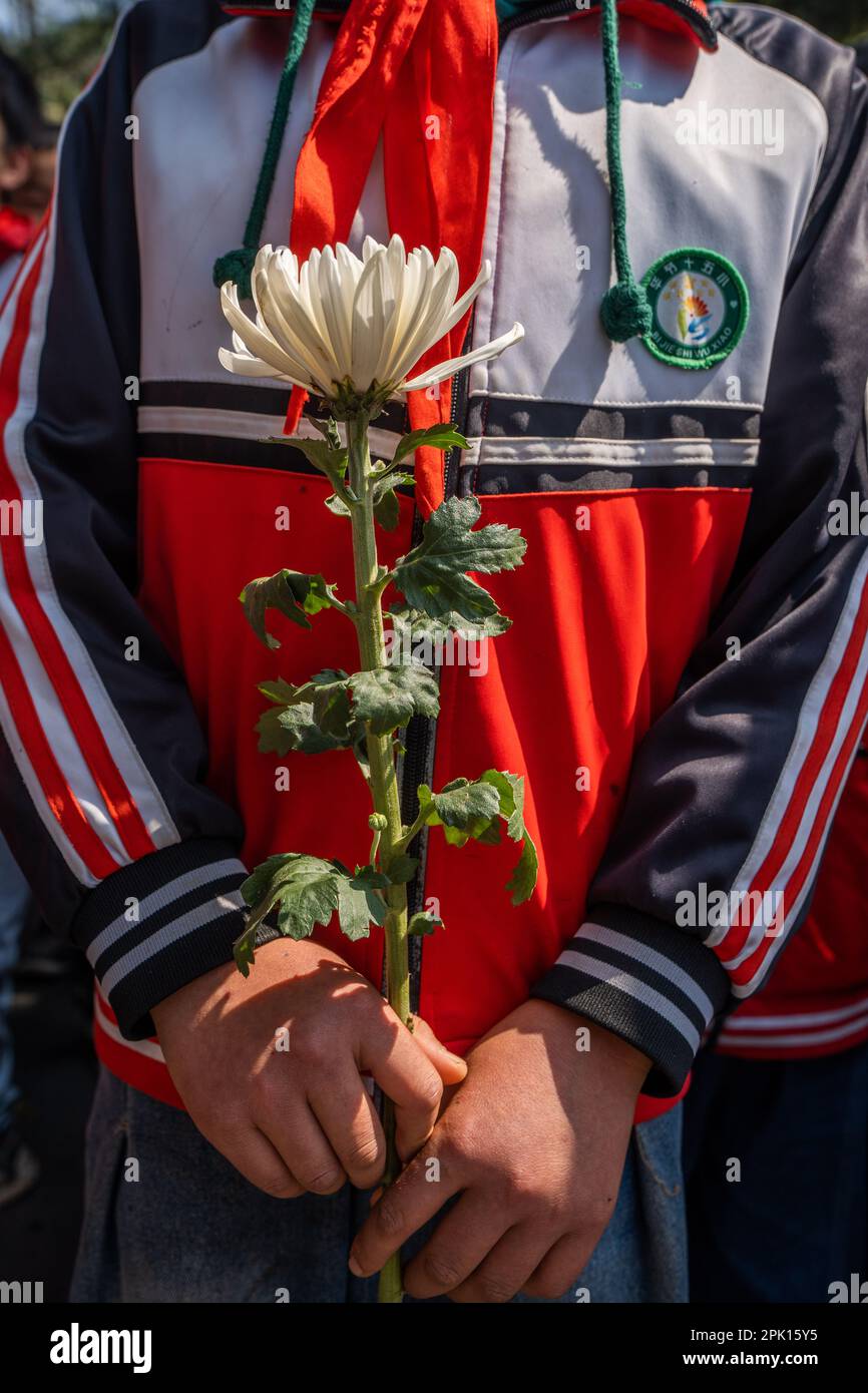 BIJIE, CHINA APRIL 4, 2023 Students pay respects to martyrs at the