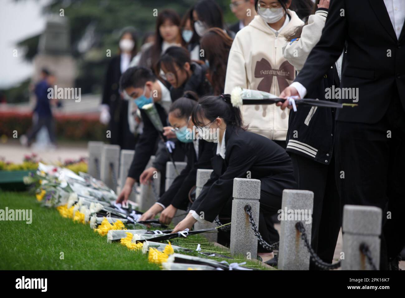 NANJING, CHINA - APRIL 5, 2023 - People present flowers to revolutionary martyrs at Yuhuatai Martyrs Cemetery in Nanjing, East China's Jiangsu Provinc Stock Photo