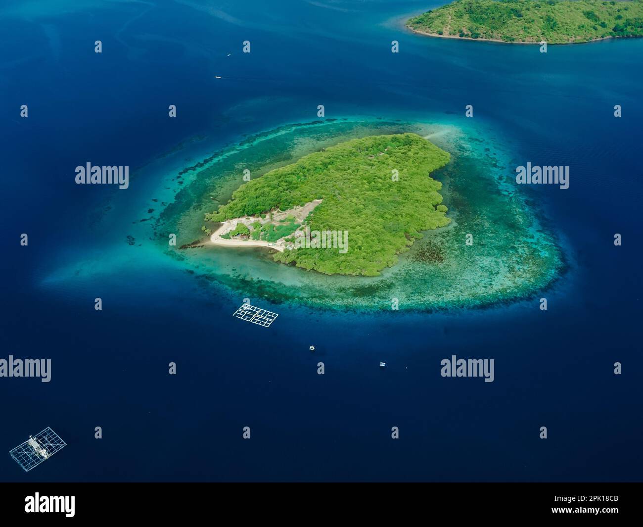 Aerial view with wild island in tropics and ocean with coral reef Stock ...