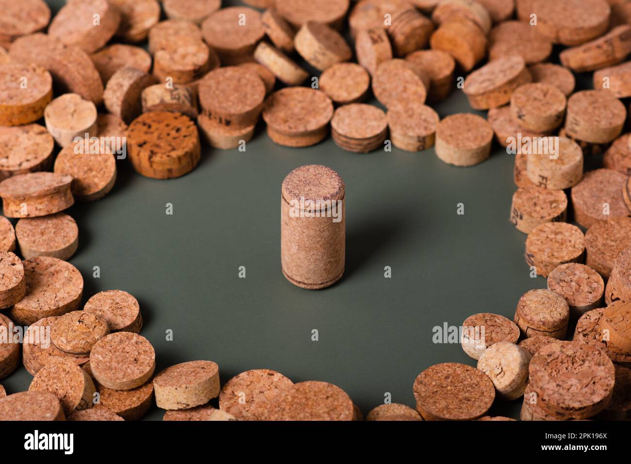 Recycling symbol and wine cork for secondary use. Preservation of the ecology of the planet. Raw materials for reuse. Environmental Protection. Stock Photo