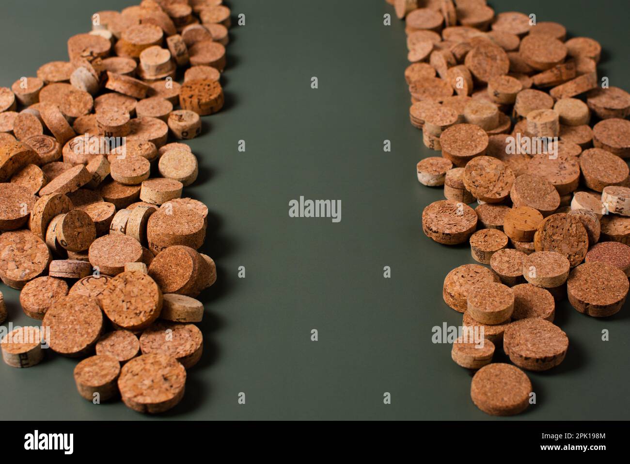 Recycling symbol and wine cork for secondary use. Preservation of the ecology of the planet. Raw materials for reuse. Environmental Protection. Stock Photo